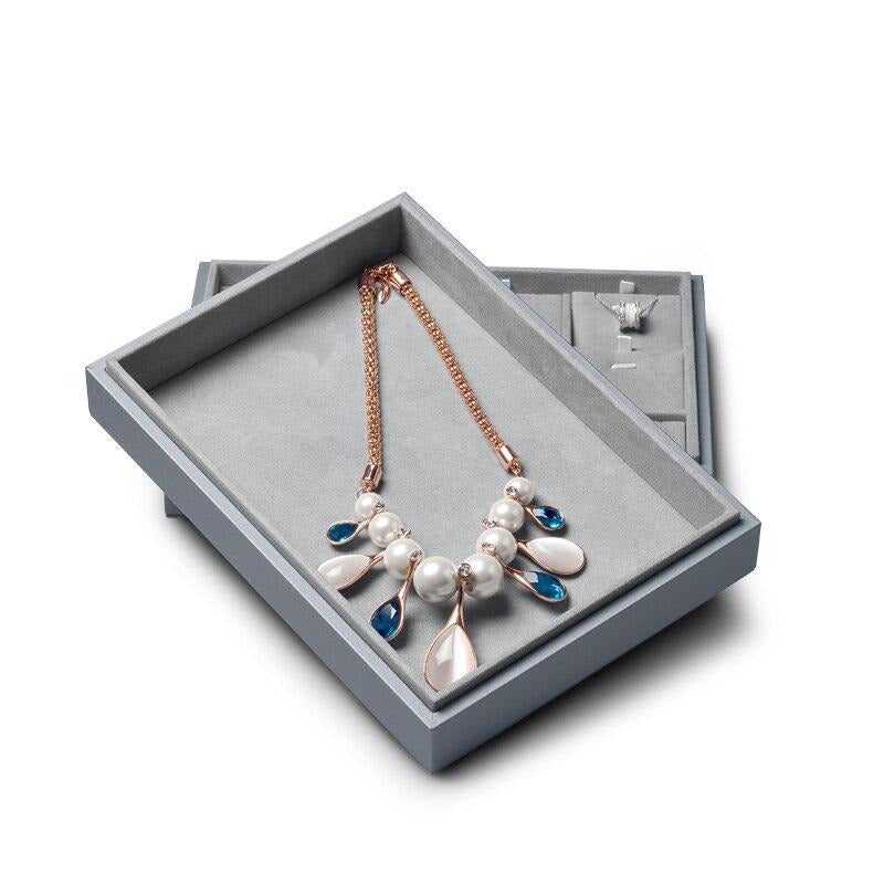 Boîte à bijoux grise