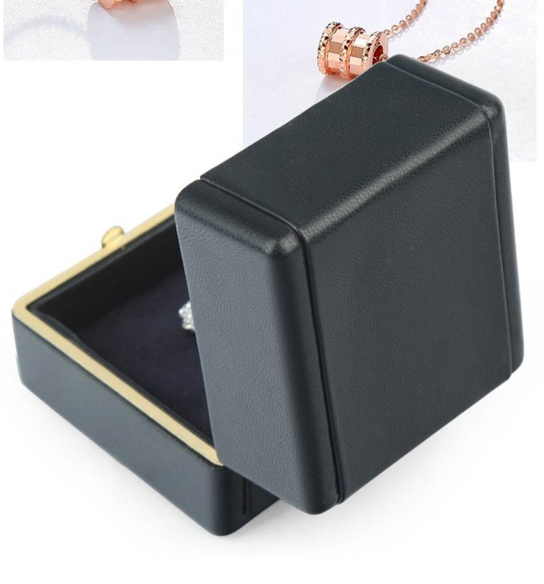 Écrin à Bague Noir Cuir